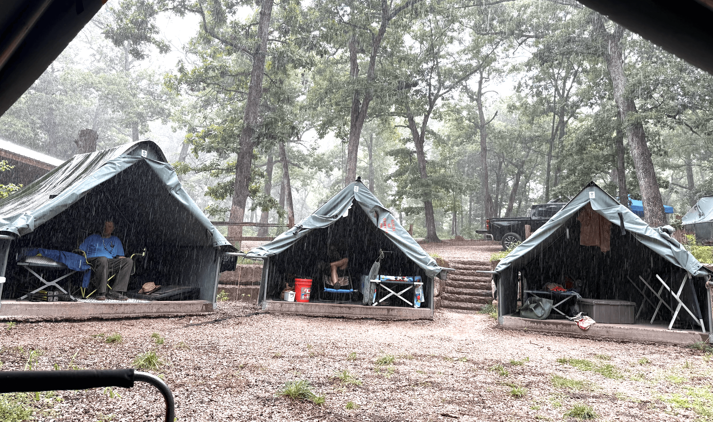 Camp tents in the rain.