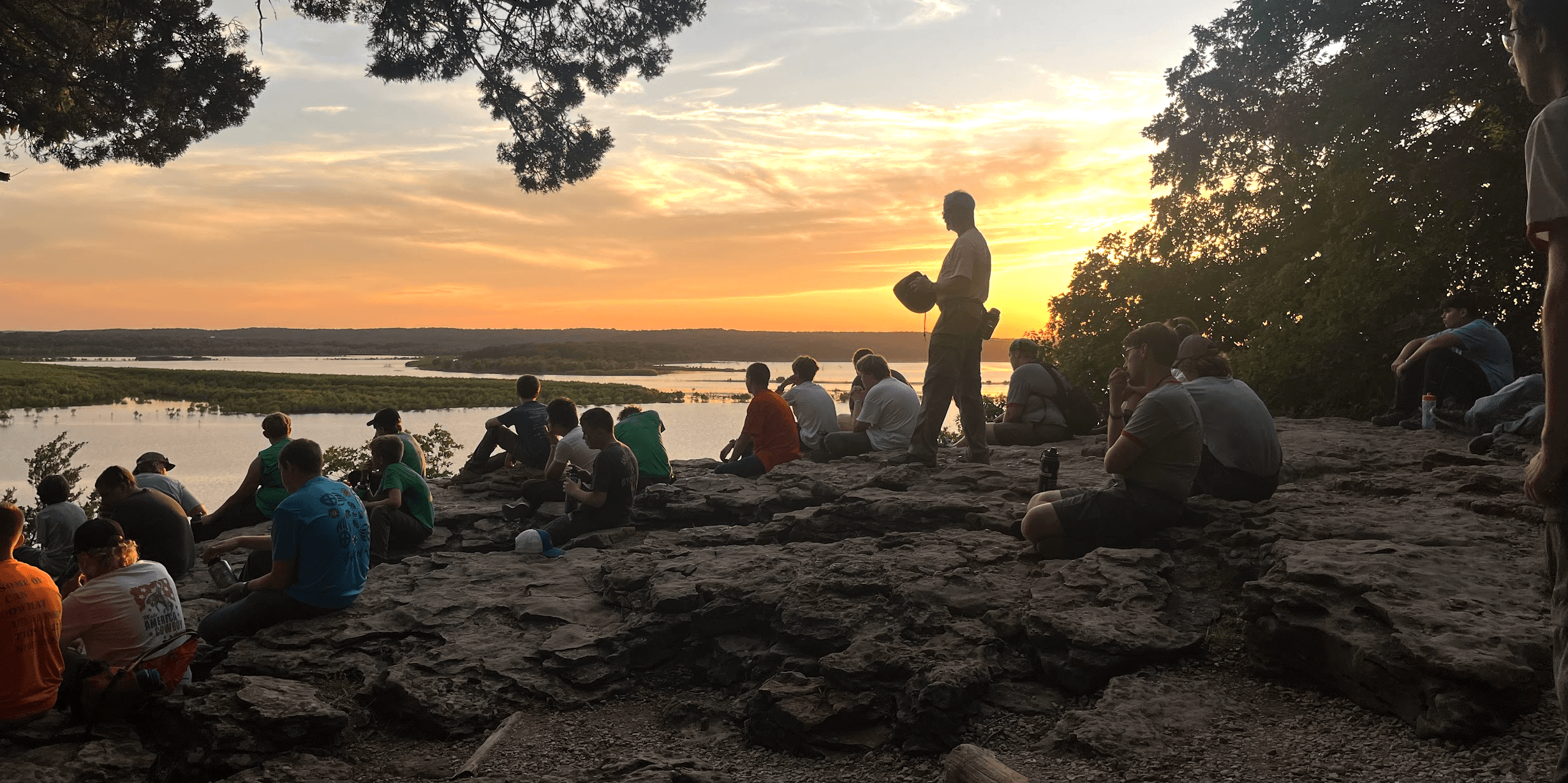 Troop enjoying sunset at the Point at H. Roe Bartle Scout Reservation